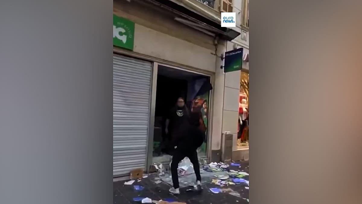 masked looters attacking shops