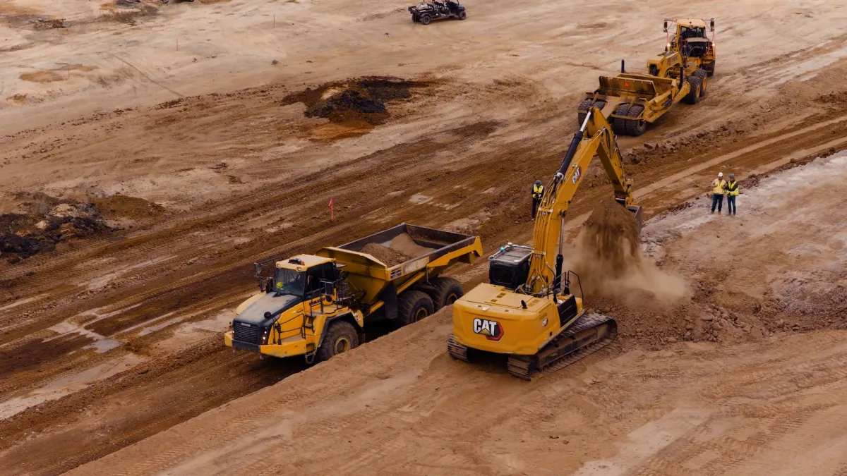 Bedrock Robotics autonomous excavator on site